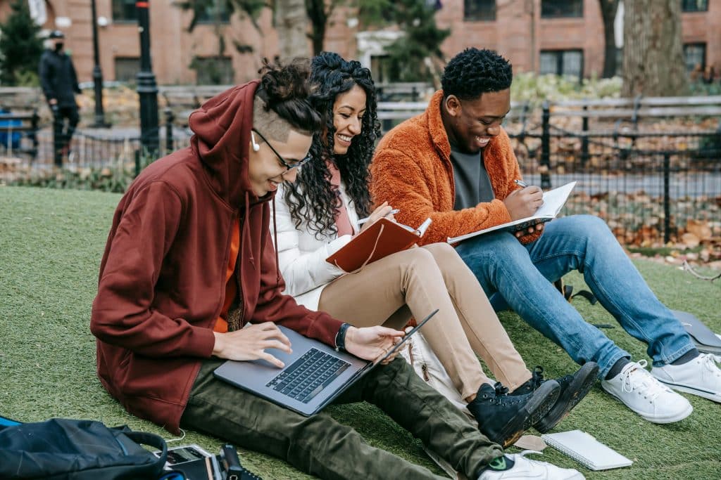 College students studying in park