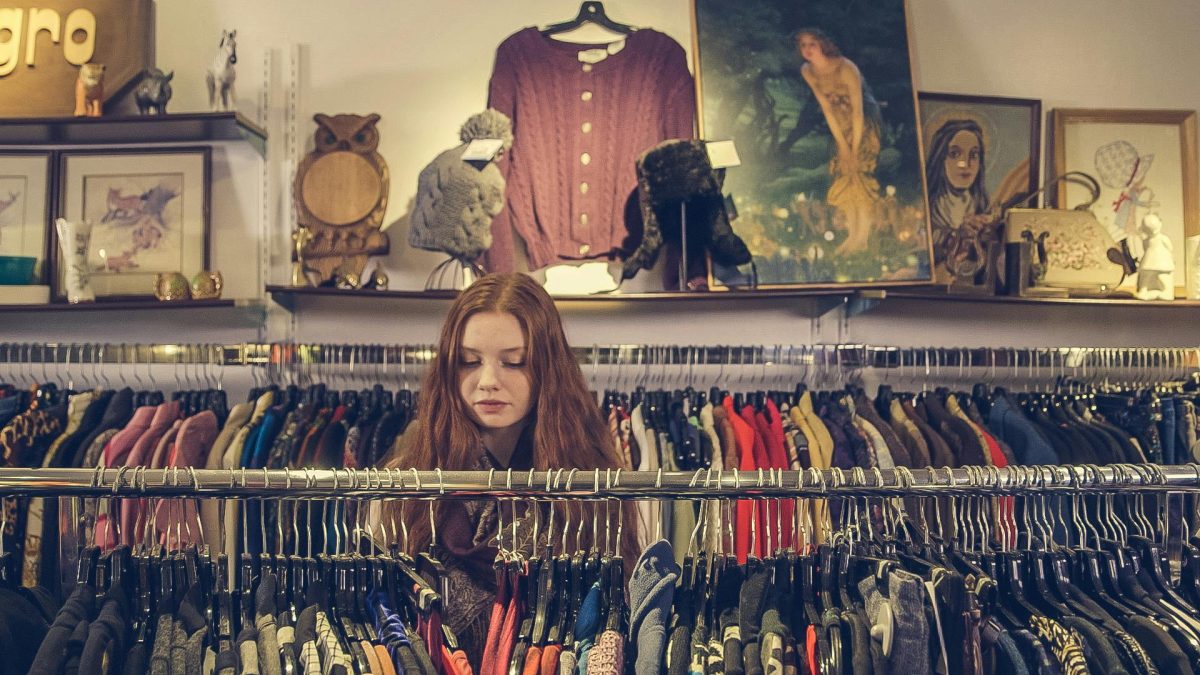A woman shopping at a thrift store