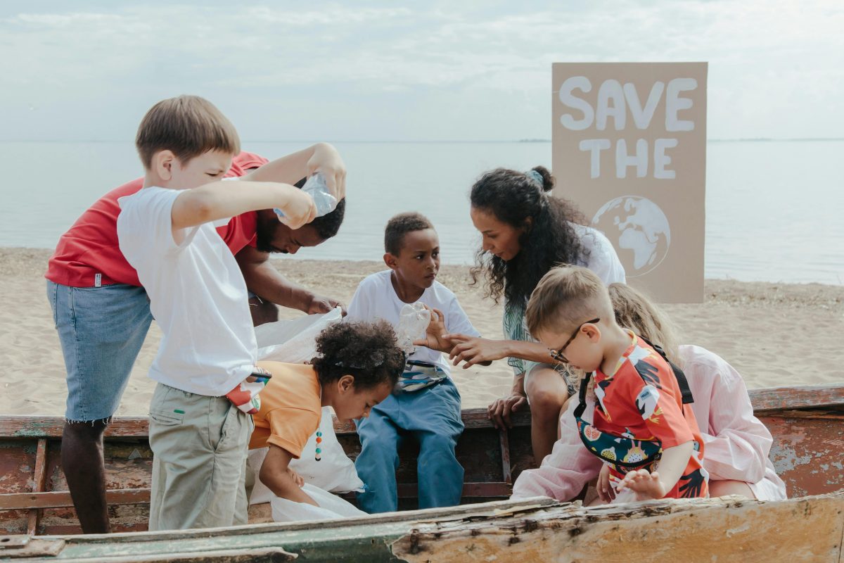 Group of children collecting plastics for Boca Raton charity