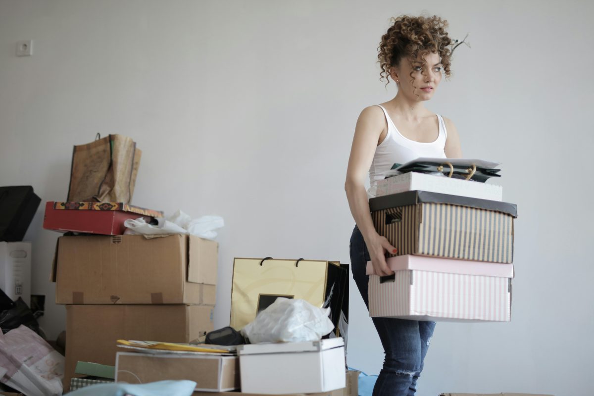 A woman with moving boxes