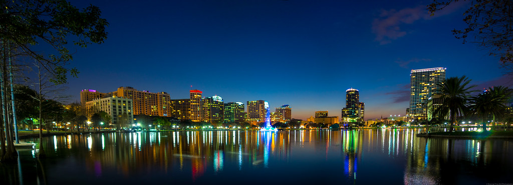 Orlando, Florida skyline over water at night