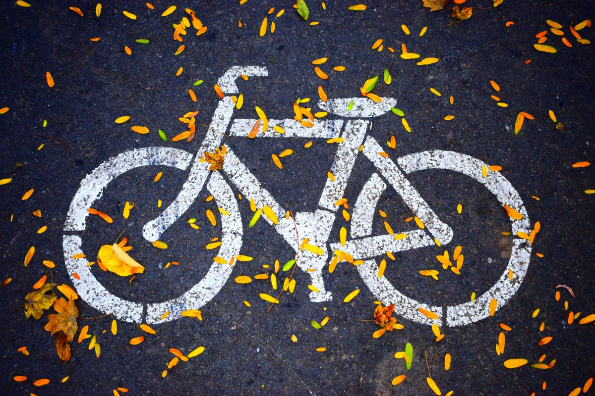 White bicycle road sign