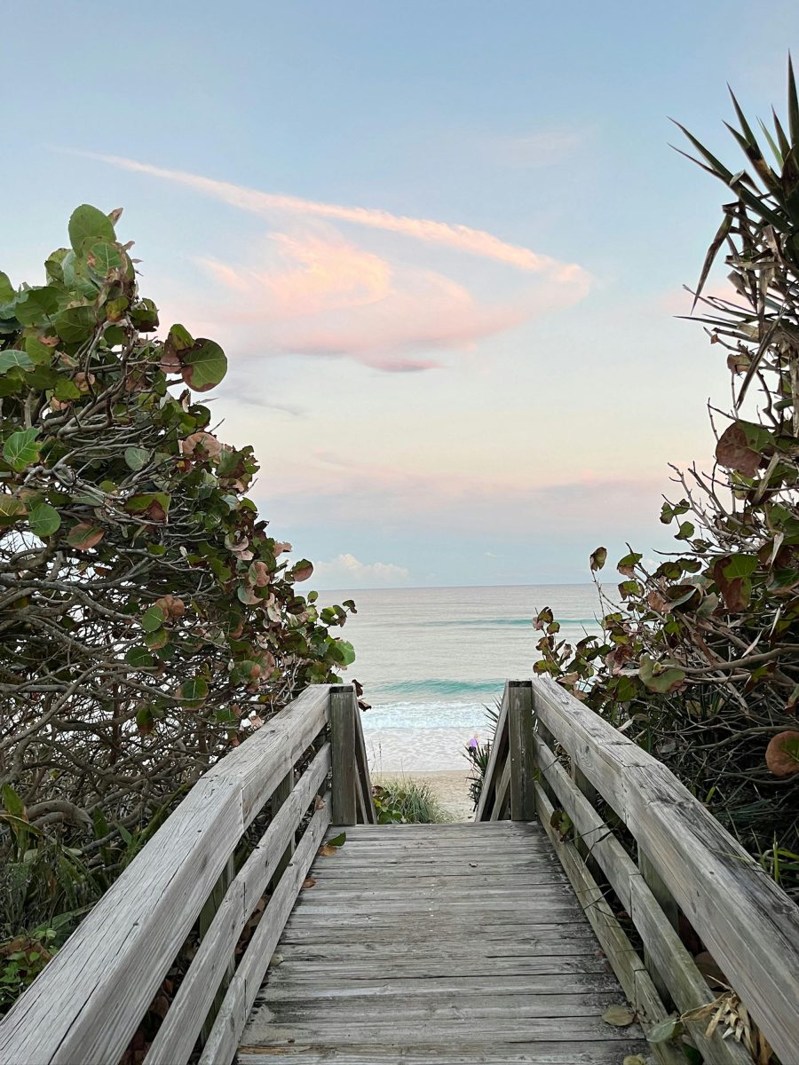 Wooden boardwalk leading to beach in Boca Raton, Florida