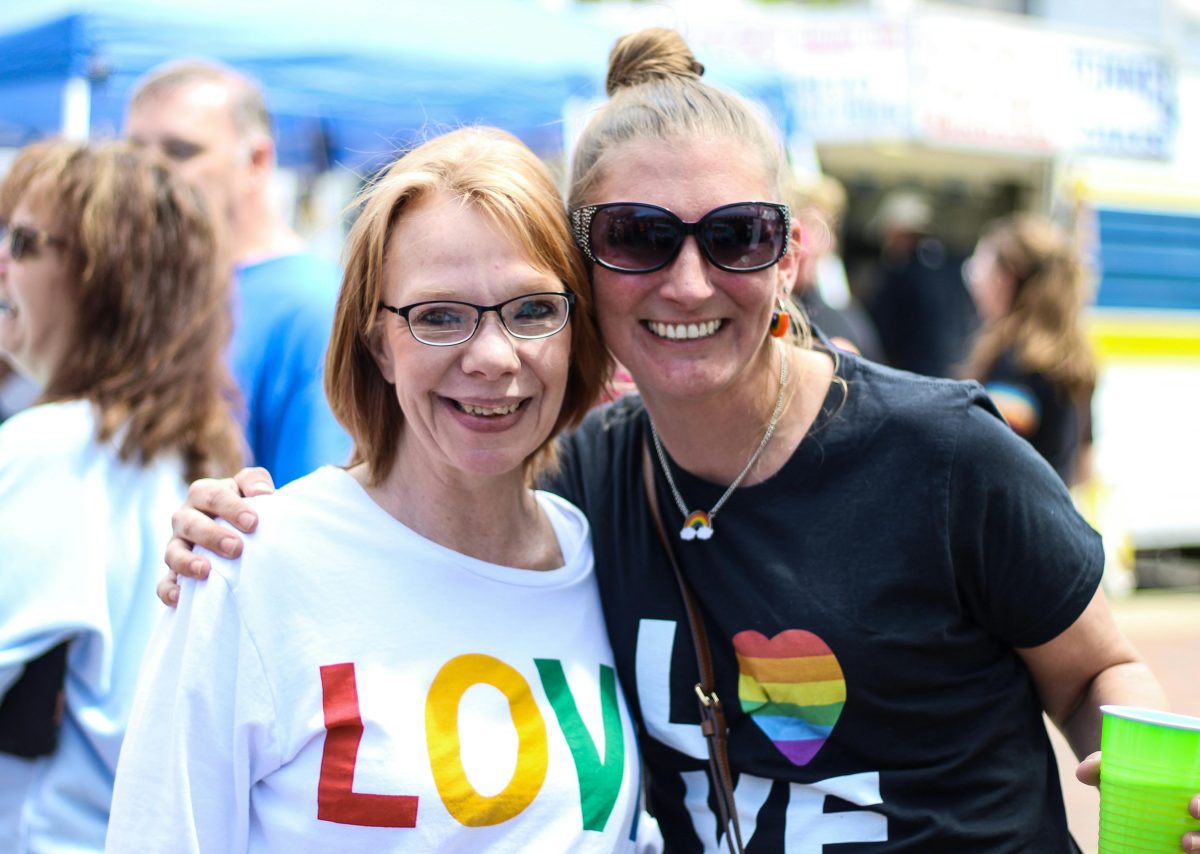 Two women posing for photo