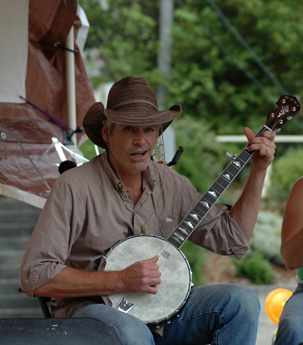 A man playing a banjo