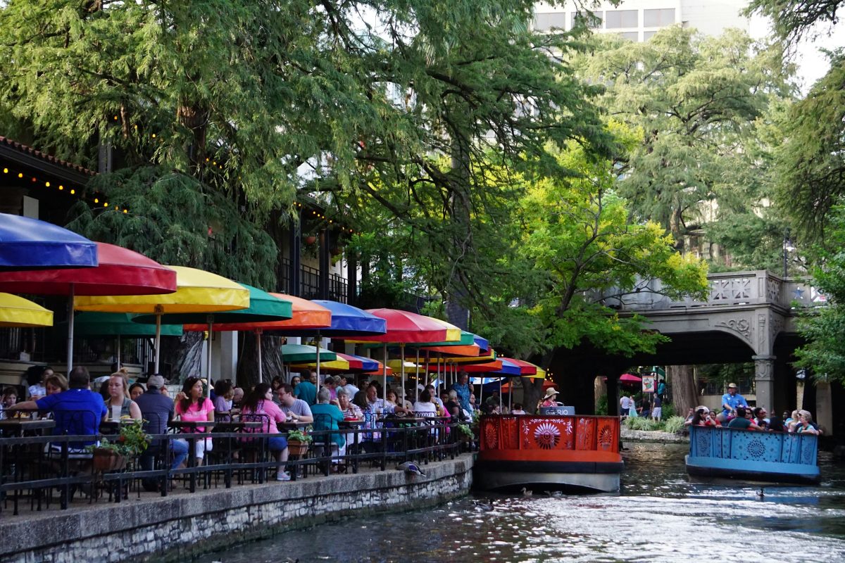 Boats near restaurants on the San Antonio Riverwalk