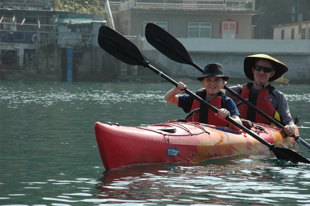 A man and child kayaking