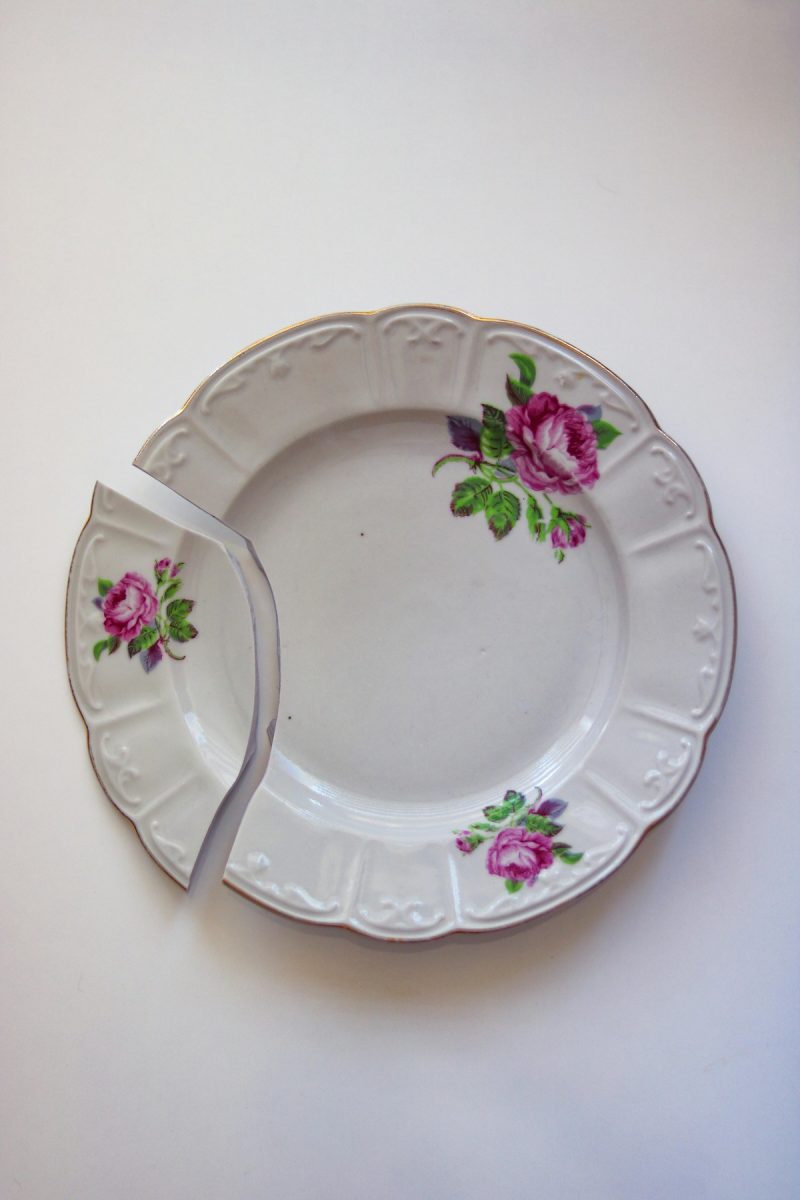 A broken dish with floral patterns