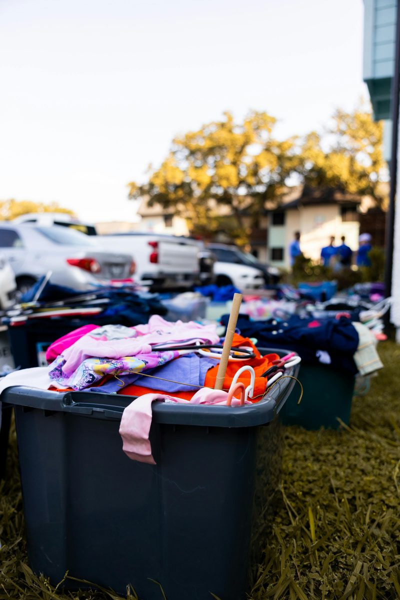 Tubs of leftover items after a yard sale