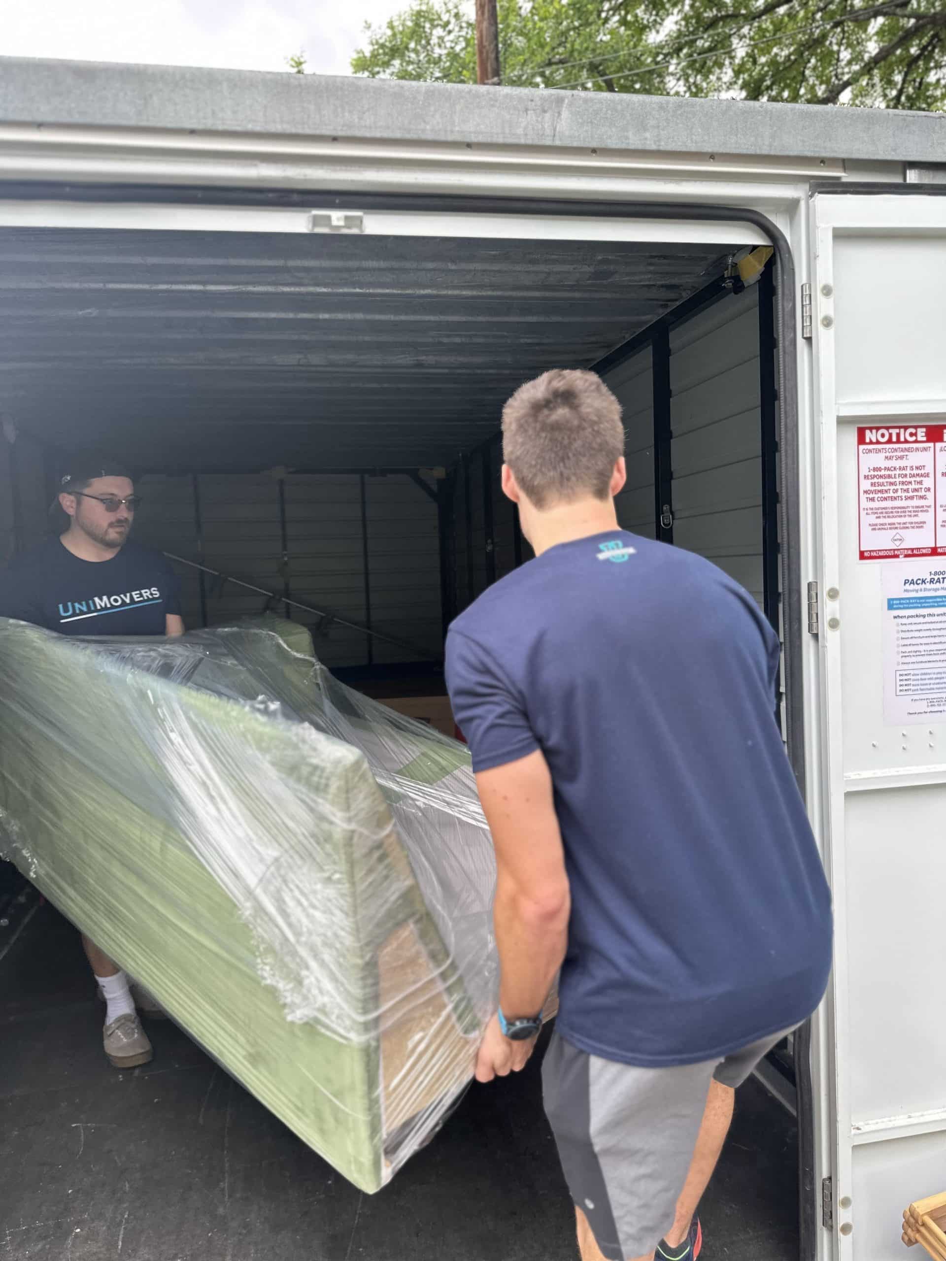 UniMovers Ames IA — Iowa State University student movers loading truck in Ames Iowa